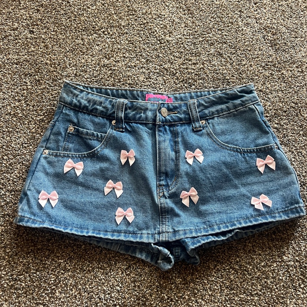 Edikted Denim Mini Skirt with Pink Bow Accents